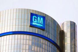 Gm Headquarters Building bearing the GM logo and emblem at the top of the Renaissance Center Towers in Detroit, MI.